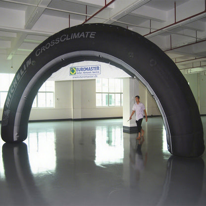KeepFuns Black tire shape inflatable semicircular arch, car brand customized arch, indoor and outdoor event promotion arch, corporate LOGO advertising arch