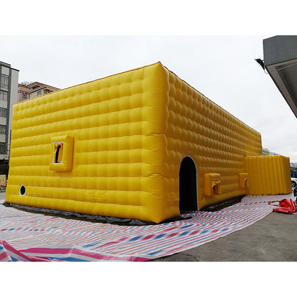 Large yellow inflatable tent, outdoor temporary event venue, disaster relief medical emergency inflatable building
