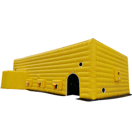 Large yellow inflatable tent, outdoor temporary event venue, disaster relief medical emergency inflatable building