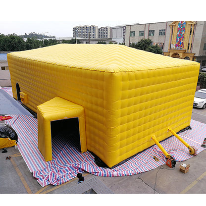 Large yellow inflatable tent, outdoor temporary event venue, disaster relief medical emergency inflatable building