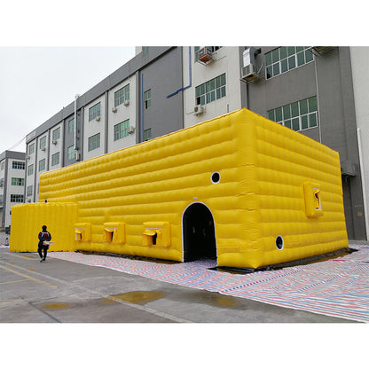 Large yellow inflatable tent, outdoor temporary event venue, disaster relief medical emergency inflatable building