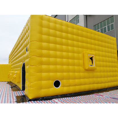 Large yellow inflatable tent, outdoor temporary event venue, disaster relief medical emergency inflatable building