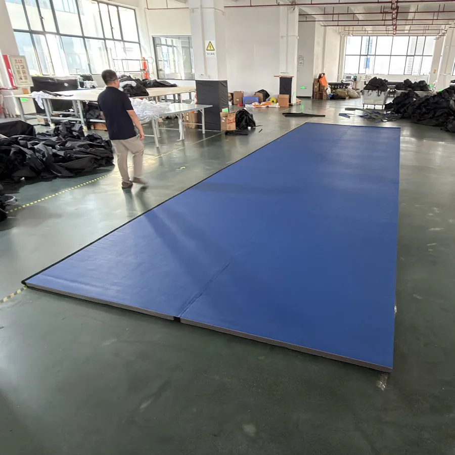 Roll Out Gymnastics Mat in blue rolled on clean floor